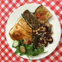 lasagna, bruschetta, bean salad, stuffed zucchini etc at Vegan Italy in Tallinn