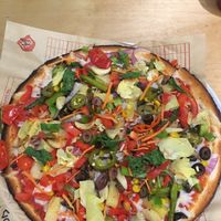 Gluten-free and dairy free dough, Daiya cheese, dairy free tomato sauce and SUPER LOADED with veggies (easier to say they added all the veggies they have rather than what I added lol!). Sooo good!! at Mod Pizza in Downey