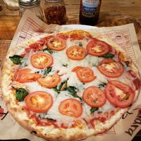 Vegan cheese, tomato sauce, tomatoes, spinach, yumm at Mod Pizza in Downey
