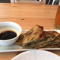 I had a scallion pancake (with tasty chili sweet soy sauce) and a beer.  at V-Vego in Adelaide