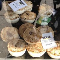 Vegan pies as seen from the shop front at The Black Olive Delicatessen in Southwold