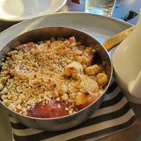 Apple and damson crumble with vegan custard at The Plough Inn in Dartford