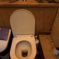 Heavily stained toilet inc under rim and in bowl  at Love Shack in East London