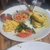 Food shared, one half of the eggs benedict with half the full english..  minus some as we prioritised eating over photos! 🤣🤣 at Love Shack in East London