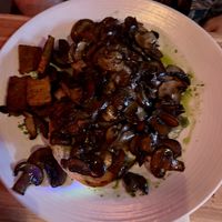 Mushrooms on toast with an extra side - under all the mushroom is a slice of lovely sourdough bread   at Love Shack in East London