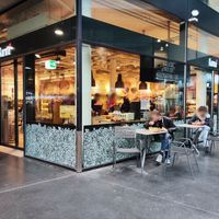 "Outdoor" seating in station hall at Karma in Zug
