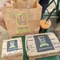 Bag with take away at The Olive Street Food  in Bruges