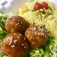 Teriyaki glazed vegan "meatballs" with vegetable and tumeric rice and salad. at Frescura PR in Catano