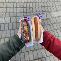 Vegan volcanic dog (left) and regular grilled hot dog (right)  at Akureyri Hot Dog Stand in Akureyri