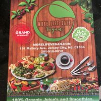 a restaurant flyer at More Life Cafe in Jersey City