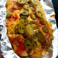 Double Dog Dare. Two vegan chili cheese dogs. I added Valentina, Sarah Jane's Jalepeño Mustard Sauce, and jalepeños of course! at Wheat Street Dogs - Food Cart in Wichita