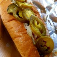 I added custom toppings. Sauerkraut, jalepeños, Valentina, Sarah Jane's Jalepeño Mustard Sauce, and a little ketchup. Delicious!!! at Wheat Street Dogs - Food Cart in Wichita