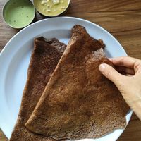 Ragi Dosa - Crepes made from millet flour, flavoured with curry leaves & cumin seeds, served with tangy chutney

 at MTR Malaysia in Kuala Lumpur