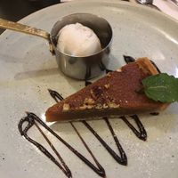 Treacle tart (asked for coconut sorbet instead of custard)  at The Sheep Heid Inn in Edinburgh