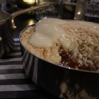 Apple plum crumble with soya custard at The Sheep Heid Inn in Edinburgh