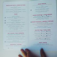 Menu, mentioning which options are not vegan ;) at Taco Santo in Ghent