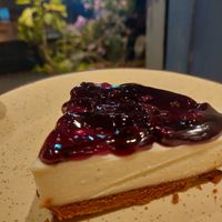 Blueberry syrup on Cheesecake at Imagine Cafe in Mumbai