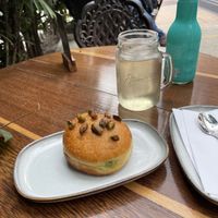 Pistachio doughnut and hatsu tea  at KAIME in Medellin