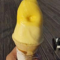 Pineapple and mango. Sorry that this photo doesn't do the swirl justice! Had to lick it up before it melted!!! at Jango's Frozen Treats in North Beach