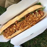 Seitan hot dog with gherkins and crispy onions at Herman ze German - Soho in London