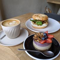 bagel with heura (fake chicken) and raw cheesecake at Religion Coffee in Madrid