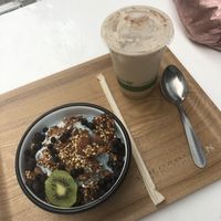 Blue magik bowl and iced chai latté  at Wild & The Moon - Amelot in Paris