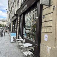Shop front. Indoor and outdoor seatingg  at Wild & The Moon - Amelot in Paris