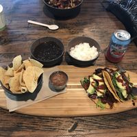Tacos served on a surfboard!  at The Secret Spot in Huntington Beach