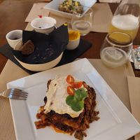 "Legendary vegan Lasagna" and "Mushroom Broccoli Risotto" (in the back) at Sabores de Sandra in Mallorca