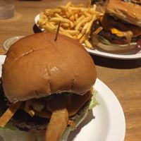 6 layer Impossible Burger =  avocado, tomato, lettuce, tortilla strips, soy chicken strips, aioli  at Strummer's in Fresno