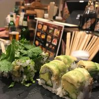 Avocado sushi with coriander. at Sushi Roll Double Quotation IKI in Osaka