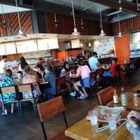 You follow as your personal pizza is being made and pick your own seating at Blaze Pizza in Tracy