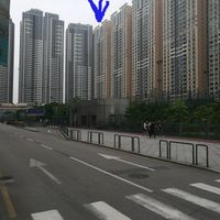 Enter through this residential tower, seen from across Taipa Central Park.
 at Rawlicious in Macau