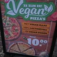 The one at the Oude Markt - Vegan advertisment at Domino's Pizza in Leuven
