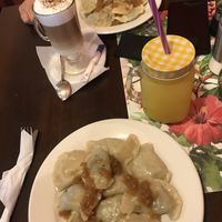 Spinach and broccoli pierogy topped with onions  at Pierogowy Raj in Krakow