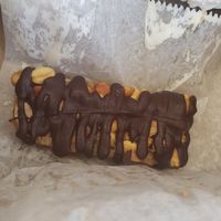 Peanut butter snickers 😋 at Dina's Vegan Deli & Desserts in West Palm Beach