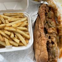 Seasoned fries and Philly  at Dina's Vegan Deli & Desserts in West Palm Beach