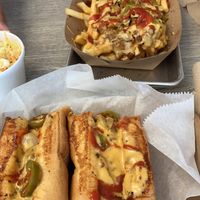 Philly cheese stake and cheese steak fries!  at Dina's Vegan Deli & Desserts in West Palm Beach