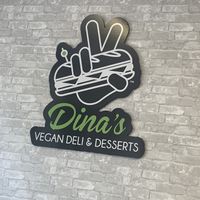 Sign at Dina's Vegan Deli & Desserts in West Palm Beach