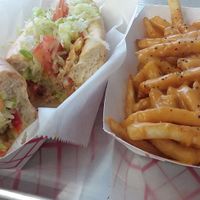 Jackfruit toona sandwich and cheeze fries at Dina's Vegan Deli & Desserts in West Palm Beach