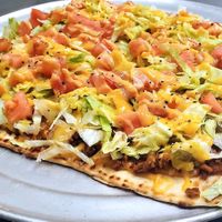 TACO PIZZA at Dina's Vegan Deli & Desserts in West Palm Beach