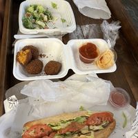 Italian sub, kale Caesar salad, Mac and cheese balls.   at Dina's Vegan Deli & Desserts in West Palm Beach