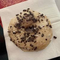 Lemon doughnut with chocolate flakes at DUH Vegan in Porto