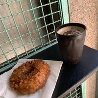 Biscoff donut and soy latte   at DUH Vegan in Porto