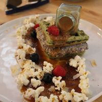 vegan matcha waffles with caramel sauce and popcorn at EatMyTrip  in Barcelona