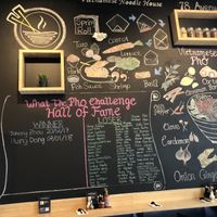 Chalkboard with What the Pho Challenge Hall of Fame at Miss Saigon in Edmonton