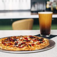 Veggie Supreme pizza. All vegan including Teese cheese. Photo:Feast magazine at Alamo Drafthouse Cinema in Springfield