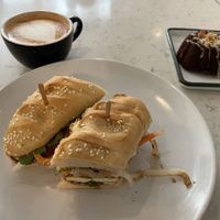 Banh mi, pumpkin spice latte (oat milk) and Bundt cake  at Moss Café in Bronx