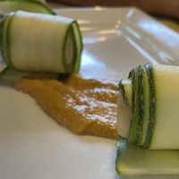 Rotolini di zucchine marinate ripiene di crema di mandorle su salsa di panzanella  at La Pepiniere in Florence