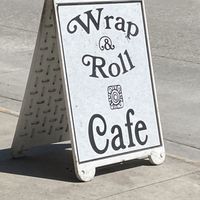 Signage at Wrap and Roll Cafe in Whitefish